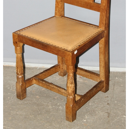 42 - Robert 'Mouseman' Thompson - A set of 4 Oak lattice backed dining chairs, with studded leather seats... 