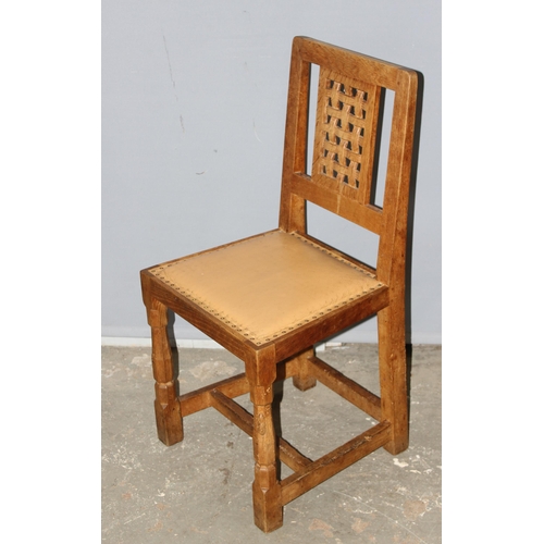 42 - Robert 'Mouseman' Thompson - A set of 4 Oak lattice backed dining chairs, with studded leather seats... 