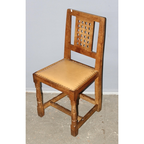 42 - Robert 'Mouseman' Thompson - A set of 4 Oak lattice backed dining chairs, with studded leather seats... 