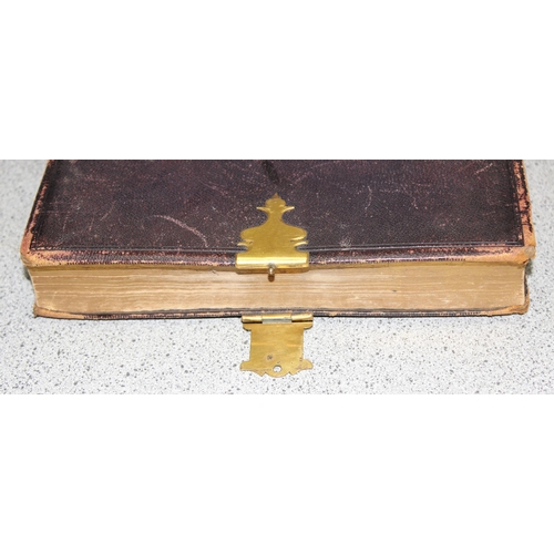 500 - An early 20th century autograph book with many interesting drawings and an antique leather bound Pol... 