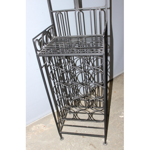 58 - Wrought iron tall wine rack with shelf approx 37cm x 32cm x 169cm