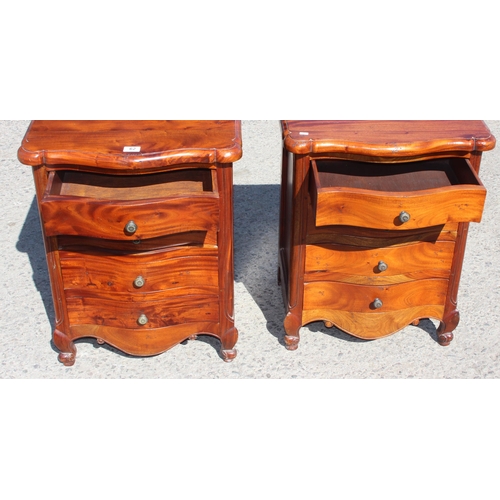 62 - A pair of wooden 4 drawer bedside cabinets, each approx 54cm wide x 41cm deep x 68cm tall