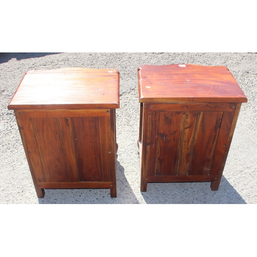 62 - A pair of wooden 4 drawer bedside cabinets, each approx 54cm wide x 41cm deep x 68cm tall