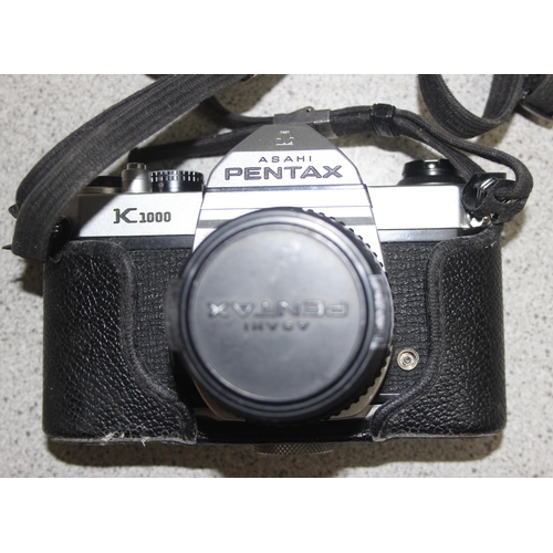 662 - Asahi Pentax K1000 camera with SMC Pentax-M 50mm lens, with Pentax-K Auto Tele Converter 2X lens, a ... 