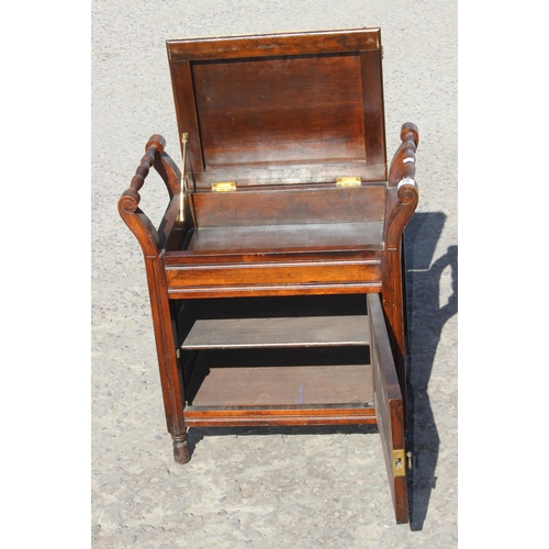 70 - An antique piano stool with storage compartment and carved details, approx 57cm wide x 34cm deep x 8... 