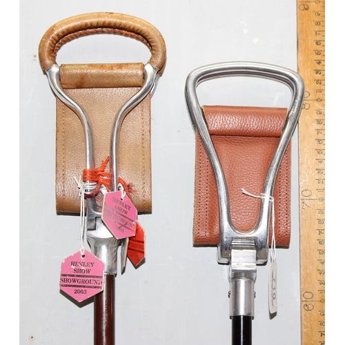 710 - Two vintage aluminium leather seated adjustable shooting sticks - one made by Gamebird the other by ... 