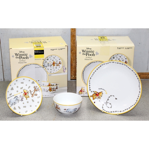 1835 - 2 x Boxed Winnie the Pooh 12 piece dinner sets, each box contains 4 x large plates, 4 x small plates... 