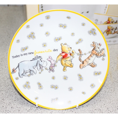 1835 - 2 x Boxed Winnie the Pooh 12 piece dinner sets, each box contains 4 x large plates, 4 x small plates... 