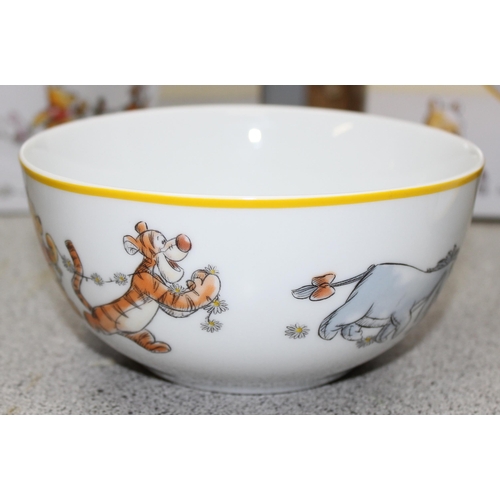 1835 - 2 x Boxed Winnie the Pooh 12 piece dinner sets, each box contains 4 x large plates, 4 x small plates... 