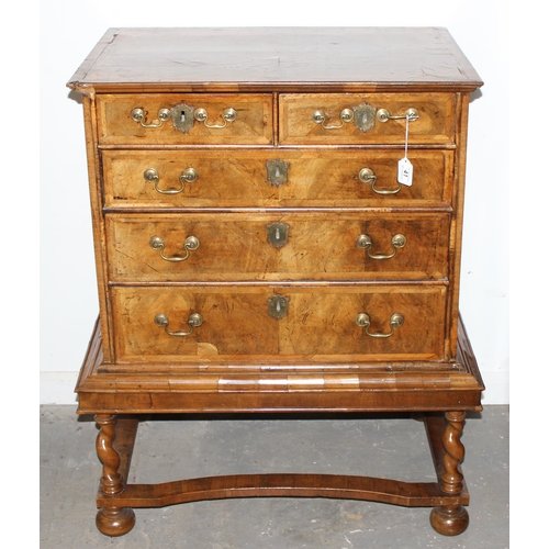 41 - A William & Mary or Queen Anne period c.1700 walnut veneer and feather-banded chest on stand of unus... 