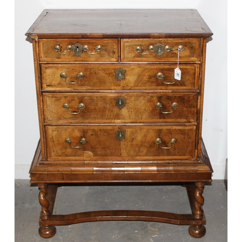 41 - A William & Mary or Queen Anne period c.1700 walnut veneer and feather-banded chest on stand of unus... 