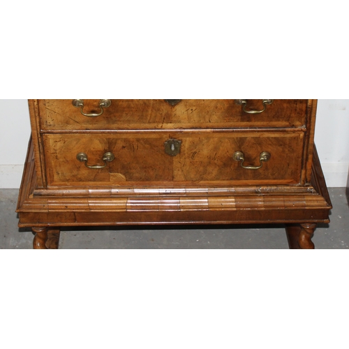 41 - A William & Mary or Queen Anne period c.1700 walnut veneer and feather-banded chest on stand of unus... 