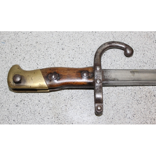 1401 - A French model 1874 bayonet and scabbard, dated 1877