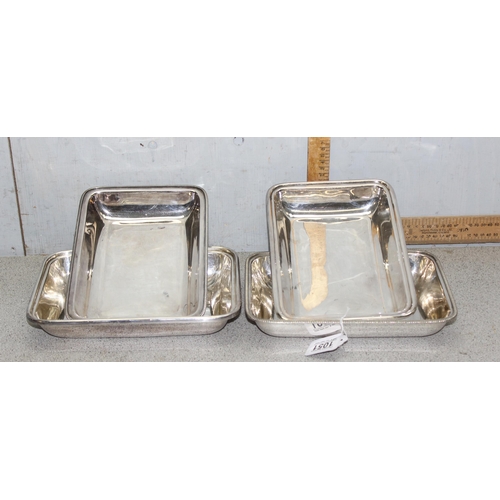 1051 - Pair of heavy gauge silver-plated entrée serving dishes, approx 28cm wide