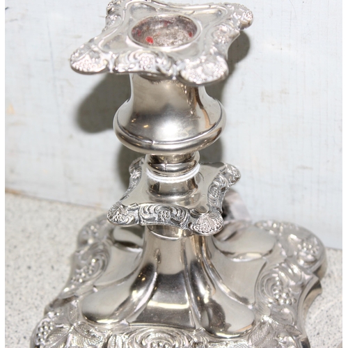 1053 - Pair of English silver-plated candle sticks with grapevine decoration, approx 14cm tall