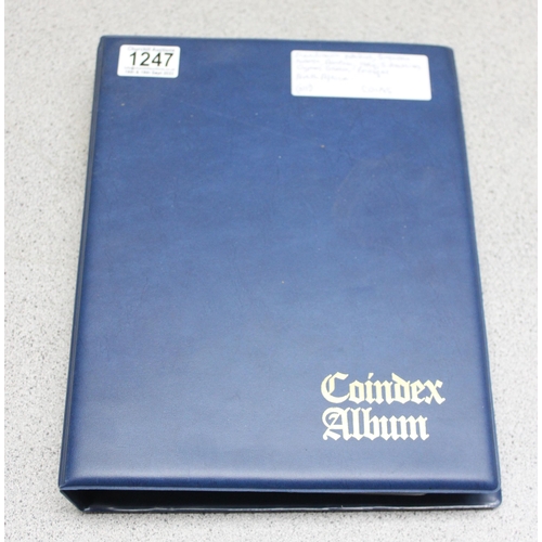 1247 - Blue album of assorted world coins, over 300