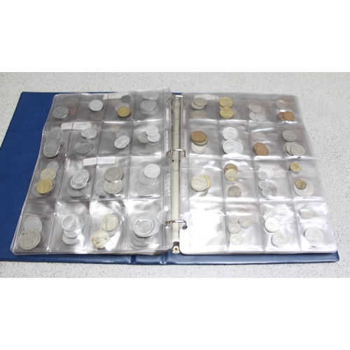 1247 - Blue album of assorted world coins, over 300