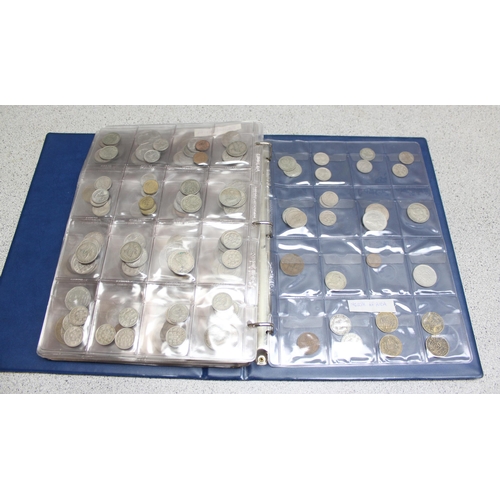 1247 - Blue album of assorted world coins, over 300