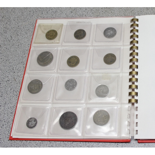 1248 - 2 albums of assorted mixed world coins