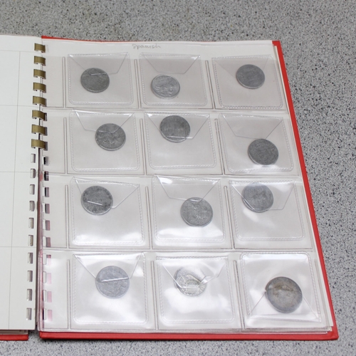 1248 - 2 albums of assorted mixed world coins