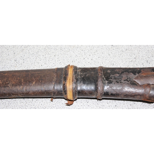 1452 - Indian Tulwar sword in scabbard, likely 19th century, blade approx 75cm long