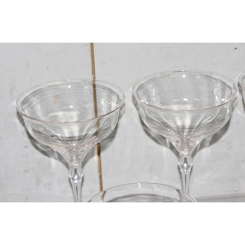 1632 - Set of 8 antique hand-blown champagne coupe glasses, each standing 14.5cm tall