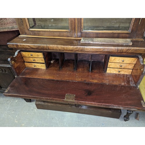 111 - A Victorian mahogany secretaire bookcase with cupboard base, approx 106cm wide x 43cm deep x 212cm t... 