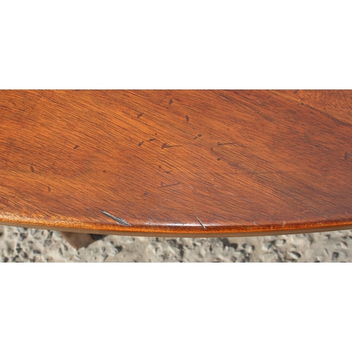 120 - An antique mahogany Irish wake table, likely late 18th or early 19th century, the extra-long oval ta... 