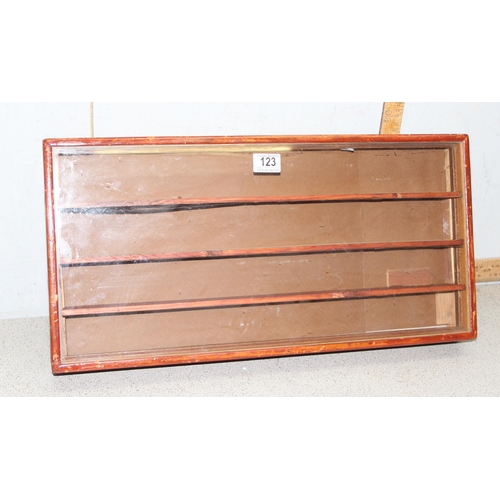 123 - A vintage wooden wall mounted glazed display cabinet, approx 60cm x 30cm x 7cm