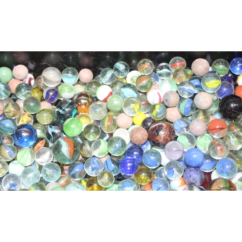 1524 - Large qty of glass and other marbles in metal tin approx 9kg