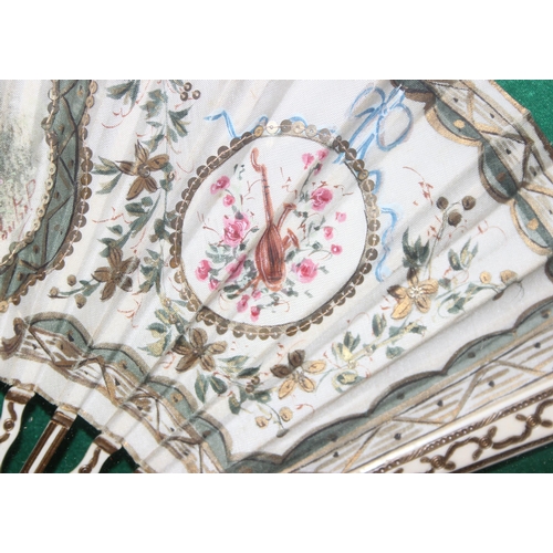 1639 - An antique hand fan with hand painted with fabric leaves, possibly silk with hand painted scene of R... 