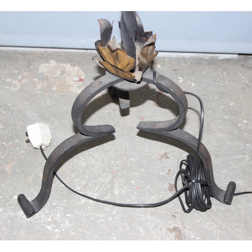 251 - An antique wrought iron oil lamp, later converted to electricity, approx 187cm tall