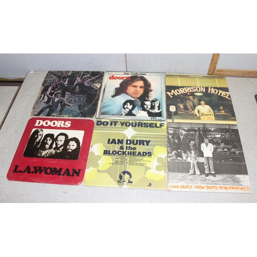 612 - Box of mixed LP vinyl records, artists A-E, to incl AC/DC, The Beach Boys, The Beatles, The Byrds, C... 