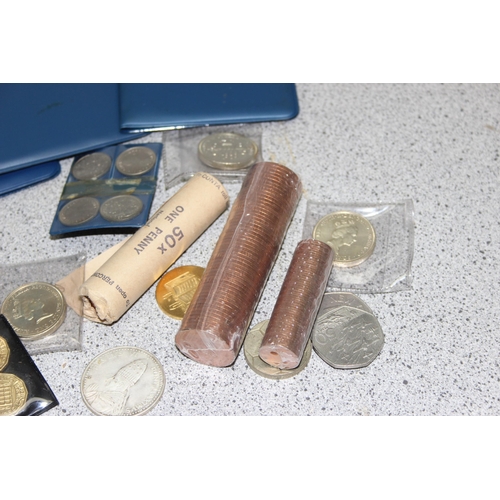 1292 - Qty of assorted interesting coins to inc coin rolls, 4 £2 coins, other cased coins and medals etc