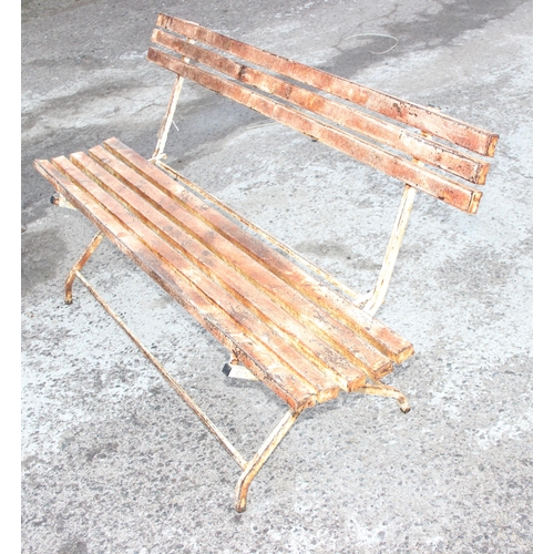 306 - A vintage metal folding garden bench, approx 150cm wide