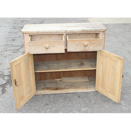 43 - Antique pine dresser base/cupboard with 2 drawers and 2 doors, approx 112cm W x 44cm D x 98cm H