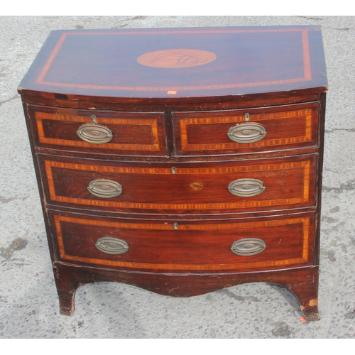 19 - Antique 2-over-2 mahogany bow-fronted chest of drawers with inlaid Sheraton style shell motif detail... 