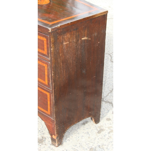 19 - Antique 2-over-2 mahogany bow-fronted chest of drawers with inlaid Sheraton style shell motif detail... 