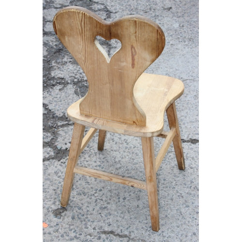 42 - Danish style pine heart-backed folk chair, approx 87cm tall