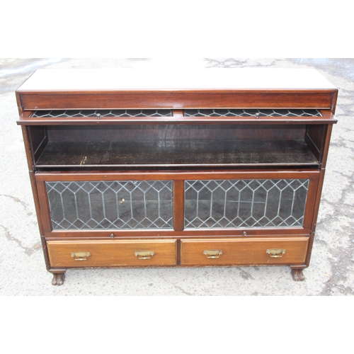 20 - Globe Wernicke style 2-tired lead-glazed bookcase with drawers on claw feet, approx 128cm W x 31cm D... 