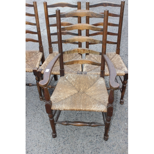 28 - A set of 6 Edwardian Arts & Crafts period ladder-backed rush-seated chairs, to incl 2 carvers, stron... 