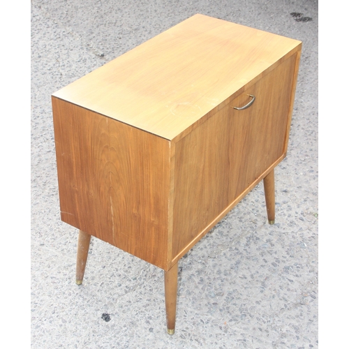 37 - Retro vinyl record storage cabinet on legs with pull-down door and dividers, approx 72cm W x 39cm D ... 