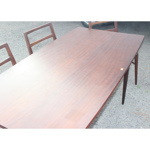 2 - Retro teak expending dining table with 4 chairs, seemingly unmarked but strongly believed to be by f... 