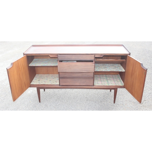 1 - A retro mid-century teak sideboard, seemingly unmarked but strongly believed to be by furniture desi... 