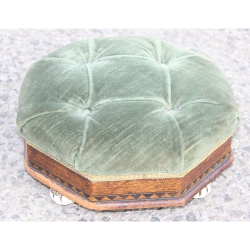 27 - Small antique octagonal shaped cushion-topped footstool on ceramic feet, with inlaid detailing