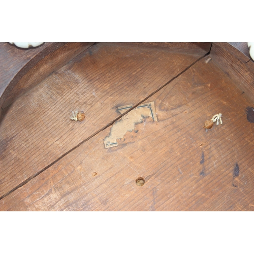 27 - Small antique octagonal shaped cushion-topped footstool on ceramic feet, with inlaid detailing