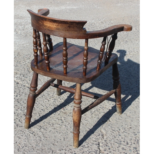 32 - Gaskell & Chambers of Birmingham, an antique elm seated smoker's bow chair, with unusual added wire/... 