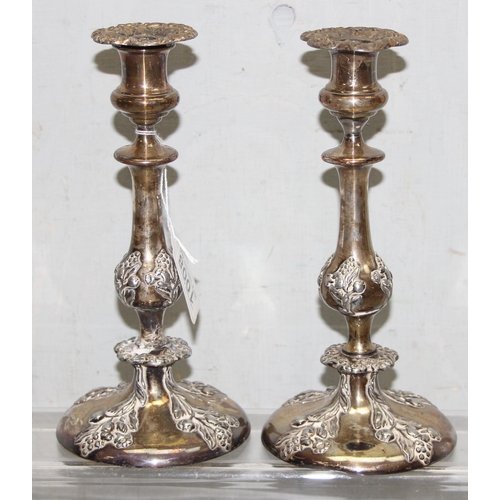 1008 - A pair of antique silver plated candlesticks, seemingly unmarked, each approx 24cm tall