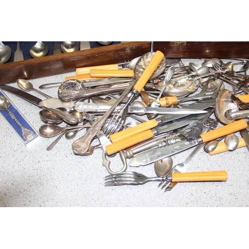 1021 - Qty of assorted antique and later cutlery, mainly silver plated, and 2 Oak cutlery boxes