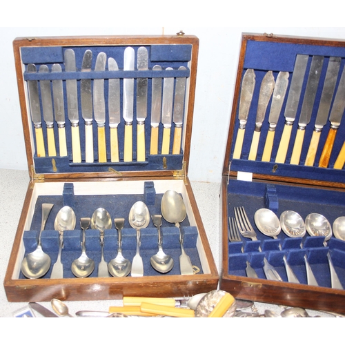 1021 - Qty of assorted antique and later cutlery, mainly silver plated, and 2 Oak cutlery boxes